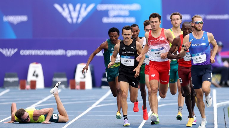 Ollie Hoare hits the deck after being tripped in the one mile run qualifiers. 