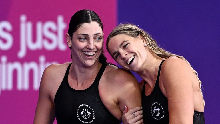 Aussie swim stars Meg Harris and Shayna Jack have a laugh during the Commonwealth Games.