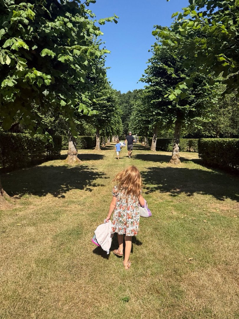 Meghan Markle has shared a series of 'summer holiday' photos of Prince Harry and their children Archie and Lilibet while in Europe - including what appears to be a visit to Princess Diana's childhood home.