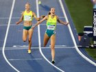 Rose Davies of Team Australia crosses the finish line to win the gold medal in the Women's 5000 Metres.