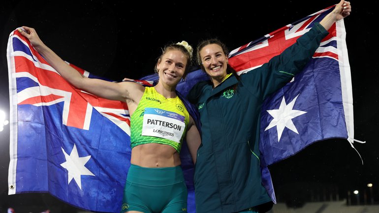 Gold medalist Eleanor Patterson of Team Australia and Silver medalist Nicola Olyslagers of Team Australia pose for a photo after competing Women's High Jump Final.