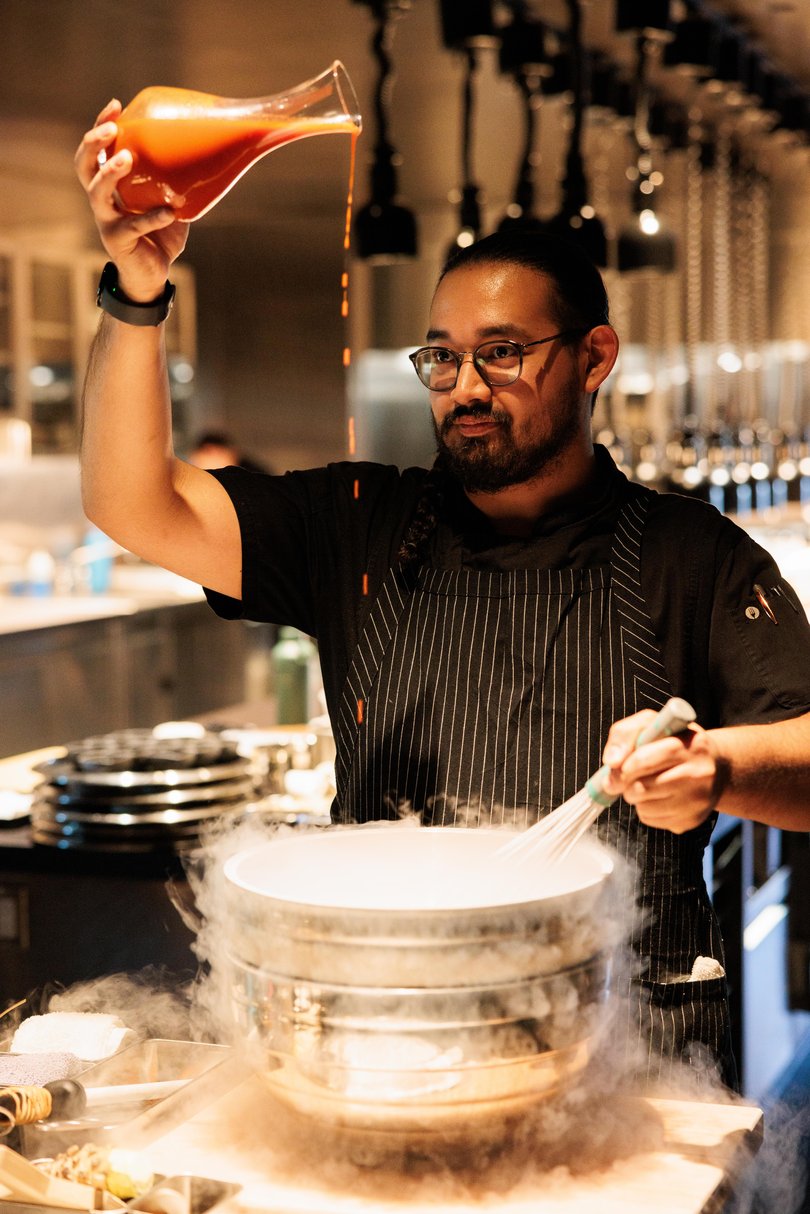 Chef Matt Bernal prepares a dish at Cyrus.