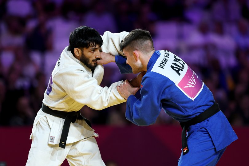 GLASGOW, SCOTLAND - JULY 31: Harsh Singh of Team India competes against Joshua Katz of Team Australia in the Men -60 kg Final on day eight of the Glasgow 2026 Commonwealth Games at SEC Centre on July 31, 2026 in Glasgow, Scotland. (Photo by Lintao Zhang/Getty Images)