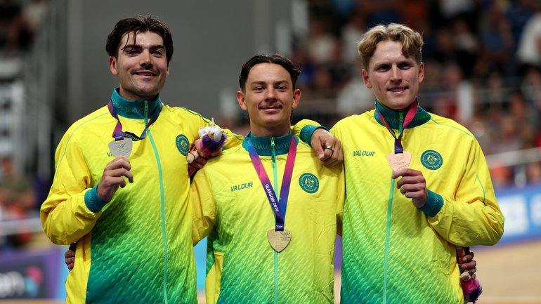 Gold medalist Oliver Bleddyn of Team Australia (C), Silver medalist Conor Leahy of Team Australia (L) and Bronze medalist James Moriarty of Team Australia (R) pose on the podium during the Men's 4000M Individual Pursuit Final.