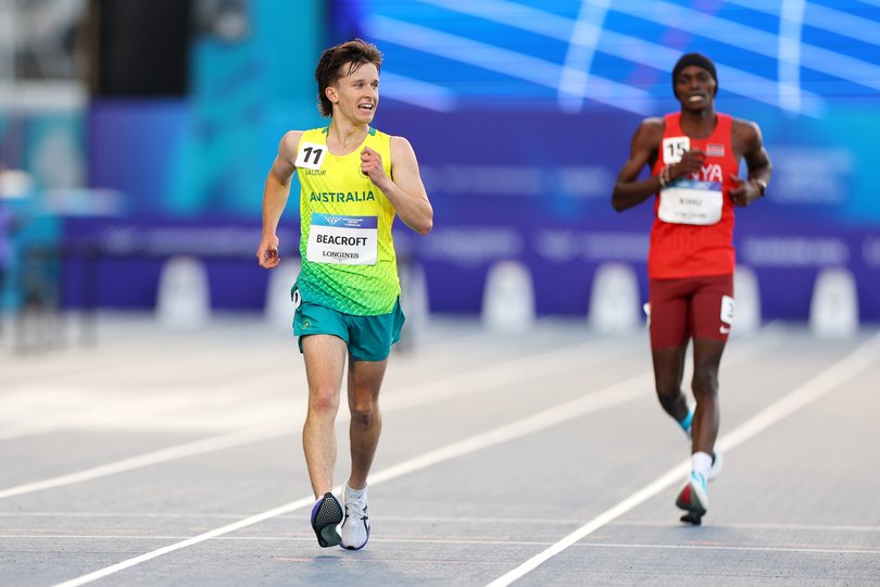 Isaac Beacroft of Team Australia crosses the finish line to win gold.
