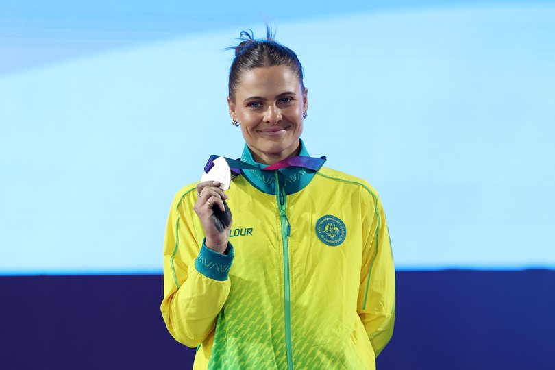 Silver medalist Nina Kennedy of Team Australia poses for a photo during the medal ceremony for the Women's Pole Vault Final.