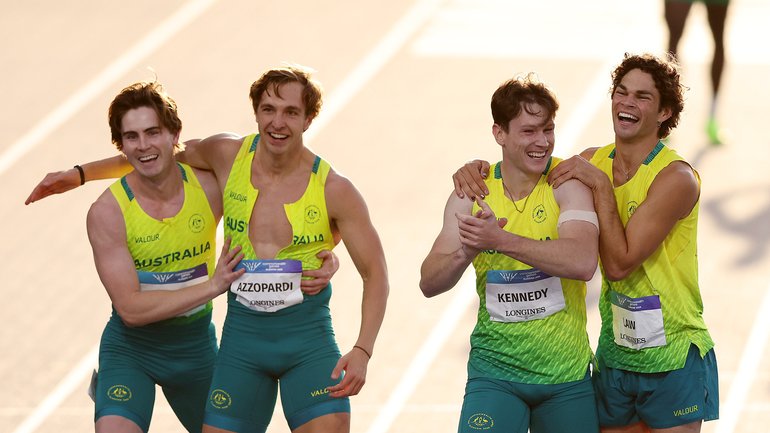 Josh Azzopardi, Lachlan Kennedy, Calab Law, and Rohan Browning of Team Australia celebrate victory in the 4x100m event.