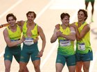 Josh Azzopardi, Lachlan Kennedy, Calab Law, and Rohan Browning of Team Australia celebrate victory in the 4x100m event.
