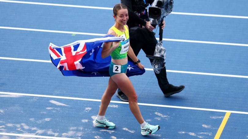 Jemima Montag celebrates her third straight gold medal.