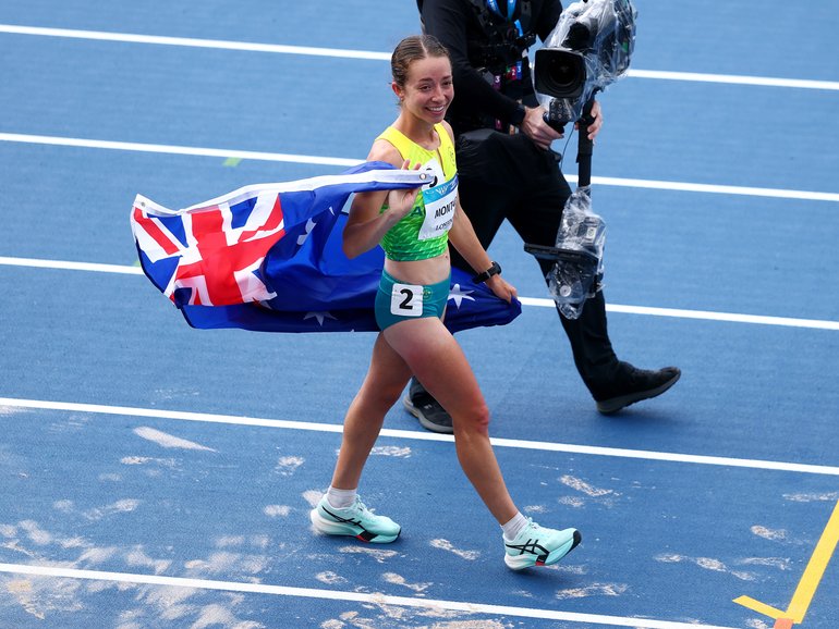 Jemima Montag celebrates her third straight gold medal.