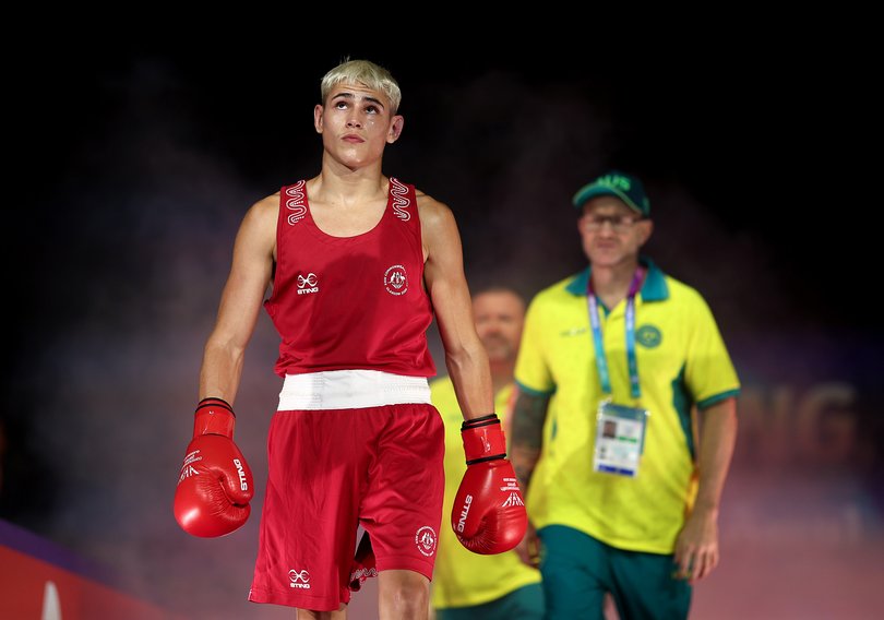 Jye Dixon of Team Australia walks out for the Men's 55kg Final Bout against Jadumani Singh Mandengbam.