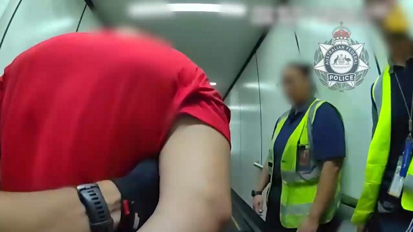 The 21-year-old allegedly assaulted a crew member and a passenger.