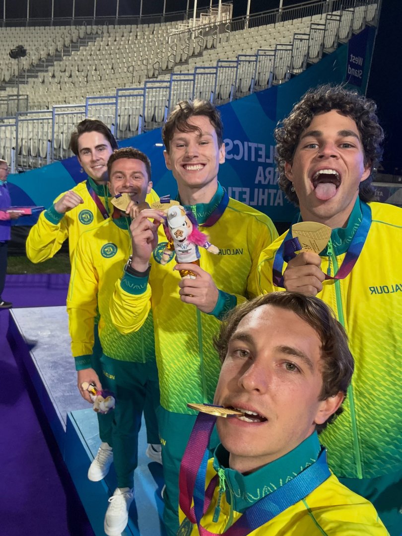 The squad with their medals.