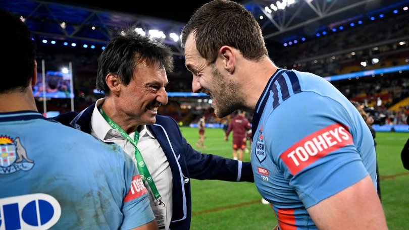 Out on a high: Laurie Daley celebrates the 2026 Origin series triumph with captain Isaah Yeo. (Dave Hunt/AAP PHOTOS)