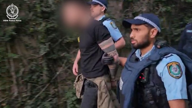 Two men aged 39 and 35 were arrested carrying a replica firearm, vest and badge at Moore Park Entertainment Quarter. Picture: NSW Police