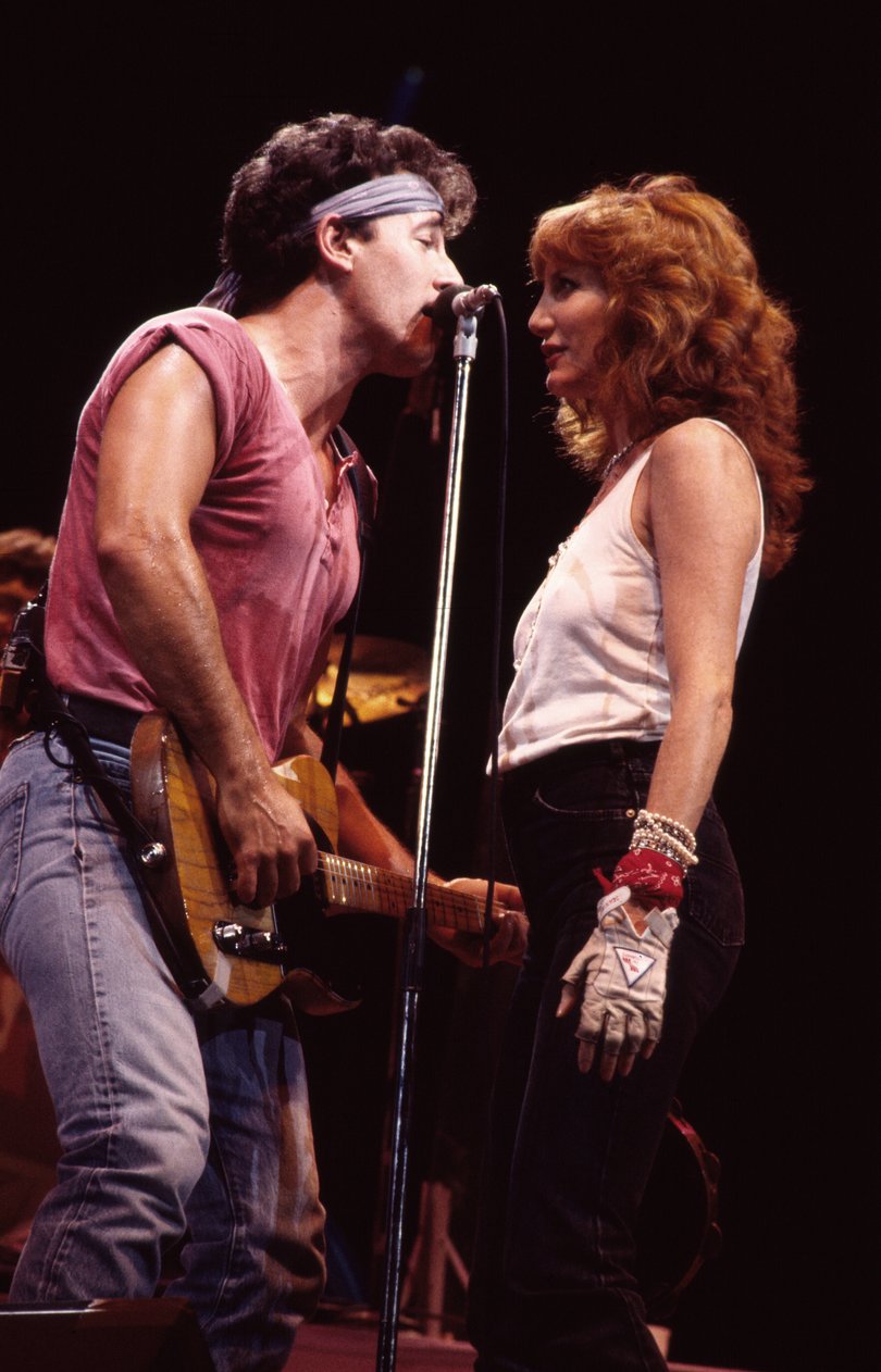 Bruce Springsteen, on guitar, and backing vocalist Patti Scialfa of the E Street Band, perform onstage.