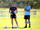 Nicho Hynes (left) and Matt King watch on during a NSW Blues training session in 2024.