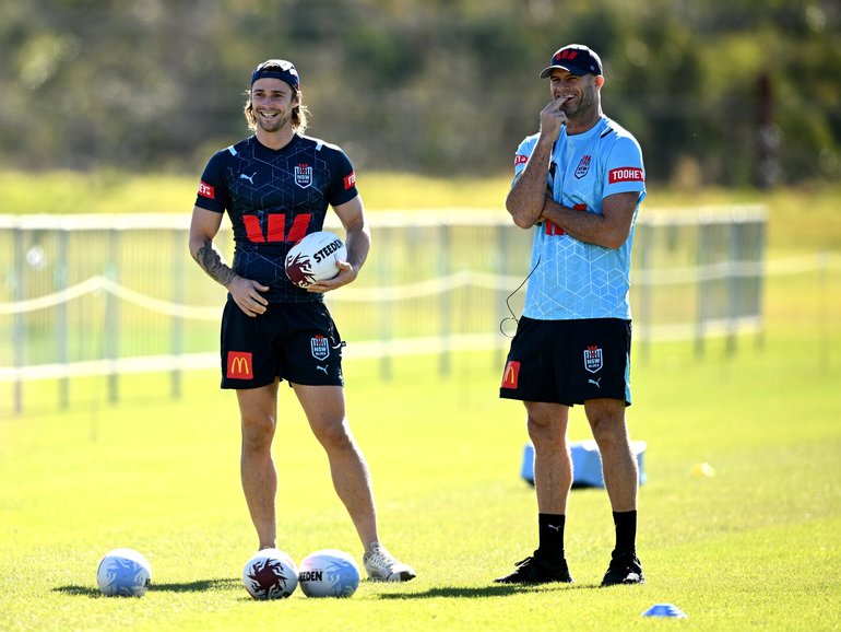 Nicho Hynes (left) and Matt King watch on during a NSW Blues training session in 2024.