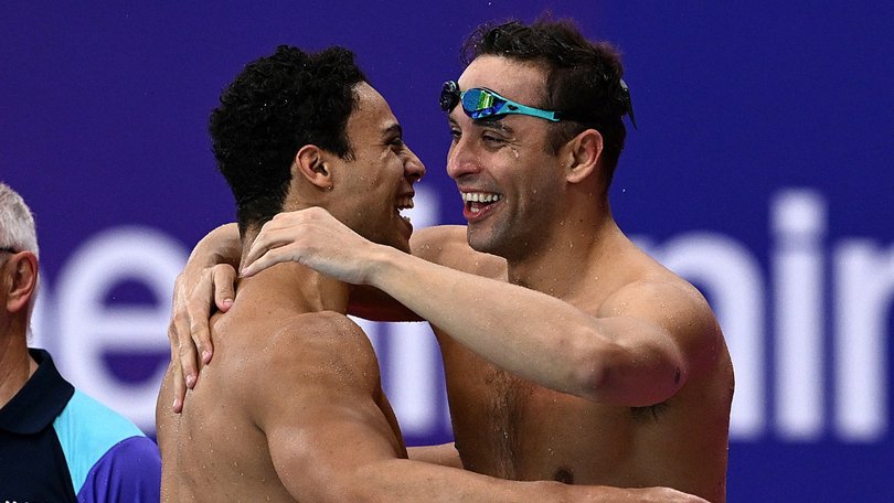 Chad le Clos (right) celebrates his record 21st Commonwealth Games medal after winning relay bronze.
