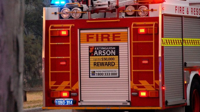 Queensland Police have launched an investigation after a property went up in flames while five young children and two adults were inside the home on Wednesday morning.