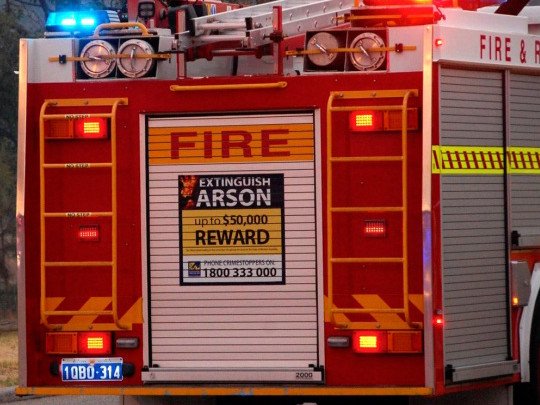 Queensland Police have launched an investigation after a property went up in flames while five young children and two adults were inside the home on Wednesday morning. 