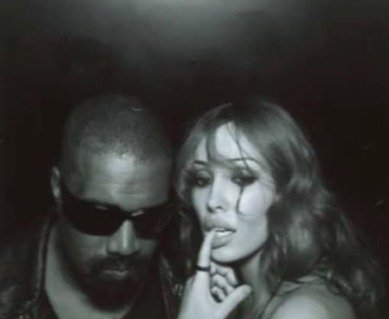 Censori, 31, is featured next to her controversial rapper husband Kanye, and the pair are pictured provocatively tongue kissing in front of the camera. 
