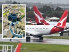 An investigation has been launched as to why a Qantas jet was cleared to cross Sydney Airport’s main runway while another aircraft was landing, amid reports of staffing woes in the air traffic control tower.