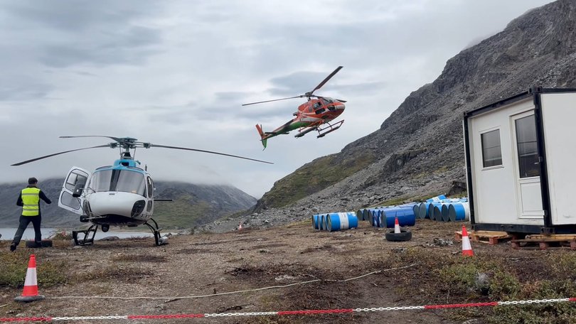 Helicopters bringing supplies to the site camp at Tanbreez Mining’s rare earth deposit in Greenland.