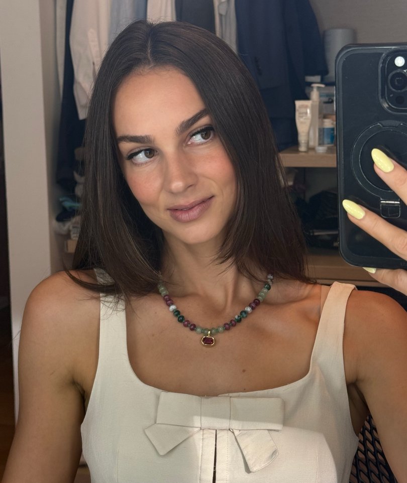 The jewellery designer says she was subject to verbal abuse from another passenger on her recent Singapore flight.