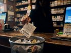 A woman who accidentally threw away a $1.64 million lottery ticket has been reunited with her life-changing prize after workers spent two days digging through tonnes of rubbish to find it.