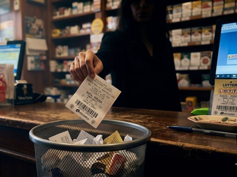 A woman who accidentally threw away a $1.64 million lottery ticket has been reunited with her life-changing prize after workers spent two days digging through tonnes of rubbish to find it.