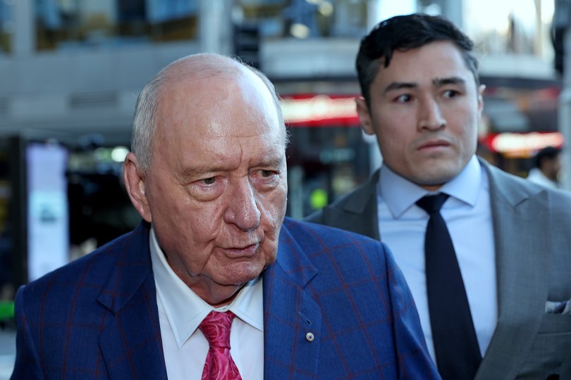Alan Jones with Lawyer Brian Wrench , leaves Downing Centre Court after the fourth day of his trial on indecent assault charges.
