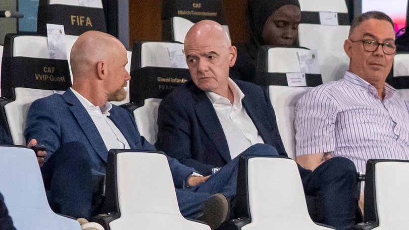 Gianni Infantino, centre, speaks to FIFA secretary general Mattias Grafstrom, left, in Morocco.