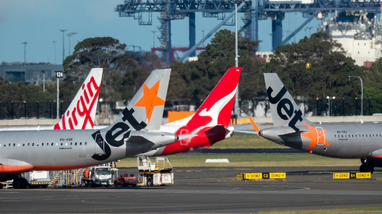 Passengers flying out of Sydney Airport have been told to prepare for delays of at least an hour for the second day in a row.