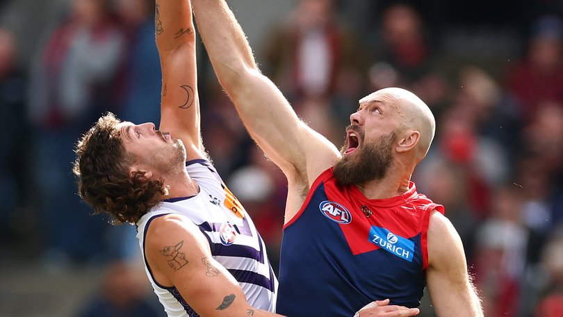 Luke Jackson of the Dockers and Max Gawn of the Demons contest the ruck.