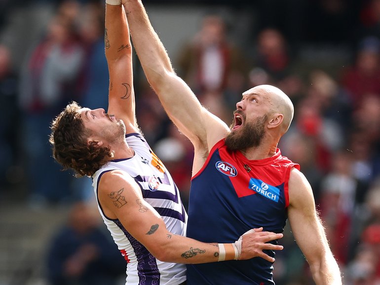 Luke Jackson of the Dockers and Max Gawn of the Demons contest the ruck.