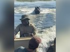 A safari trip has taken a terrifying turn after a hippopotamus charged towards a boat carrying tourists in Botswana, with dramatic footage capturing the animal racing though the water in pursuit of the vessel.