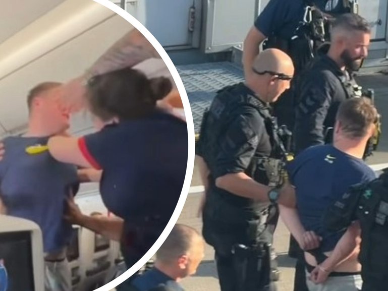 A disruptive passenger has been dragged off a plane in handcuffs after his violent outburst forced the pilot to ground the flight.