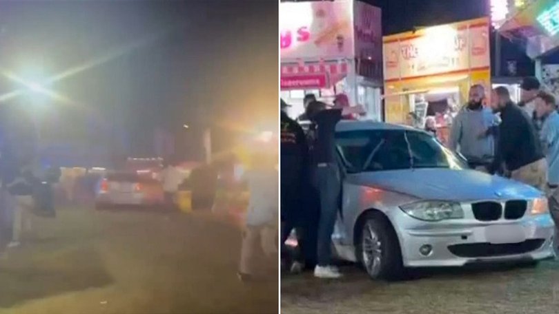 People were forced to jump out of the way of the moving car.