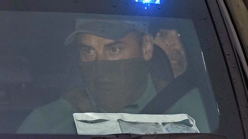 Daniel Kinahan (back, right) leaving the Criminal Courts of Justice in Dublin, where he was remanded in custody charged with directing an organised crime group, after being extradited from Dubai.