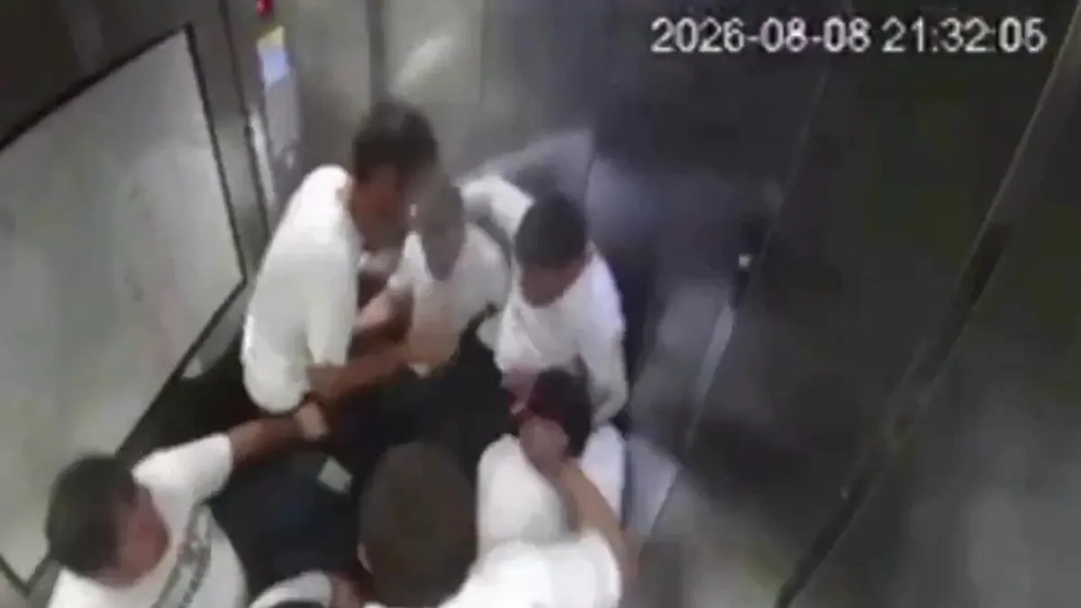 High-rise building lift plunges 15 metres with nine men inside, four suffer broken legs