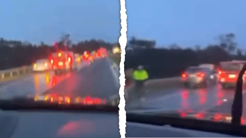 A giant pothole on a major Australian road has damaged dozens of cars, leaving drivers stranded in wild winter weather.