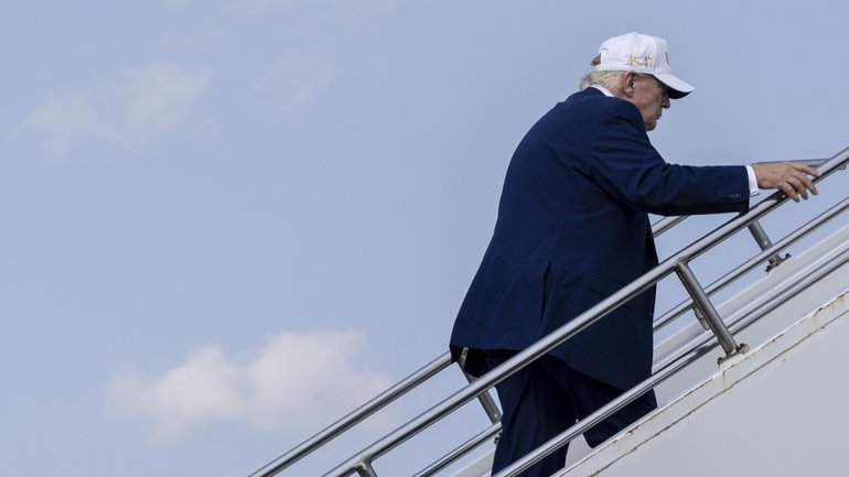 Donald Trump boards Air Force One on Augus 9, 2026. 