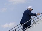 Donald Trump boards Air Force One on Augus 9, 2026. 