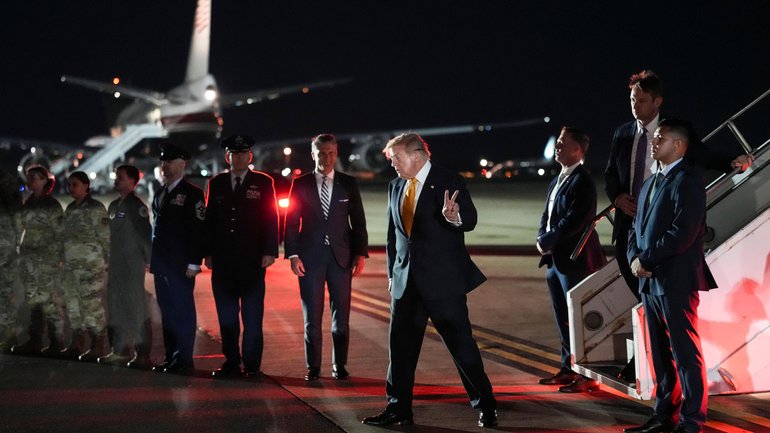  President Donald Trump  disembarks from Air Force One, after he had secretly reboarded it at Royal Air Force Mildenhall in the United Kingdom on July 8.