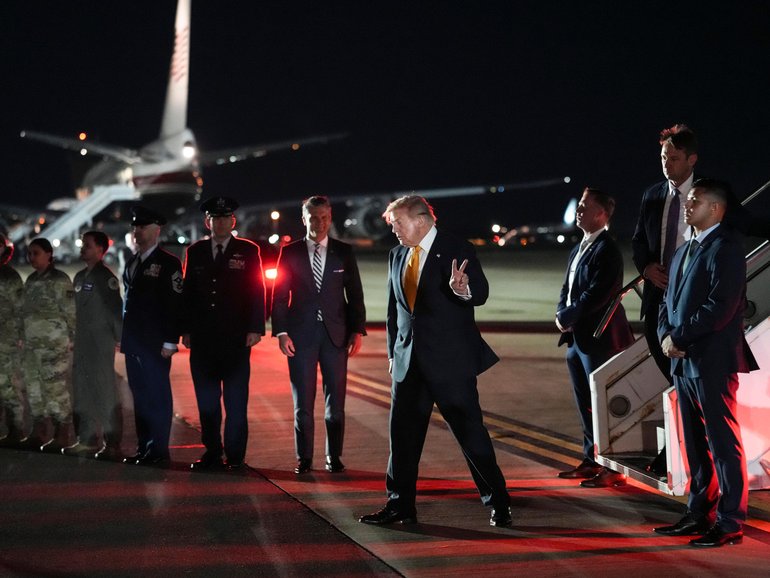  President Donald Trump  disembarks from Air Force One, after he had secretly reboarded it at Royal Air Force Mildenhall in the United Kingdom on July 8.
