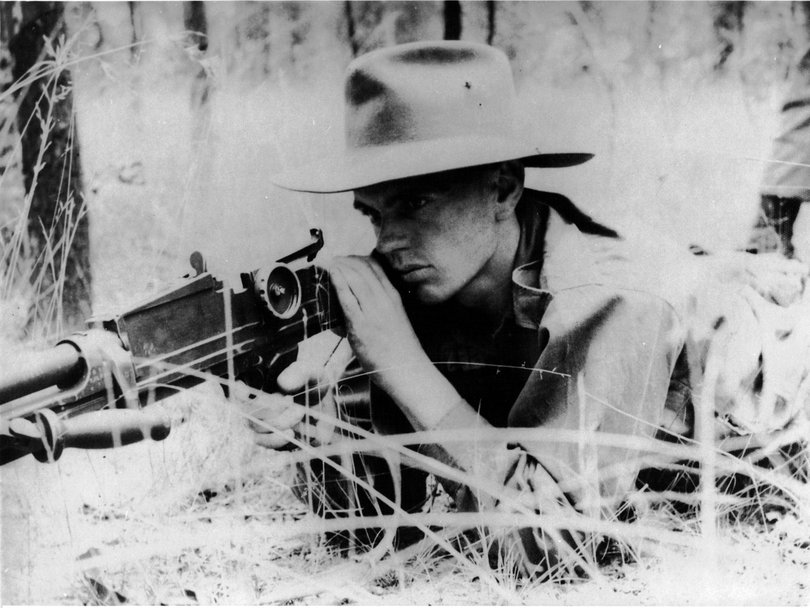 Private Richard Aldersea with a Bren Gun.
