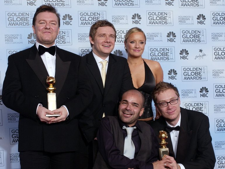 Ricky Gervais (left) has sent love to his The Office co-star Lucy Davis (back right) after her revelation that she has “incurable” breast cancer. 