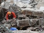 Rescuers in Colombia are racing against time as the possibility of finding quake survivors dwindles. (AP PHOTO)