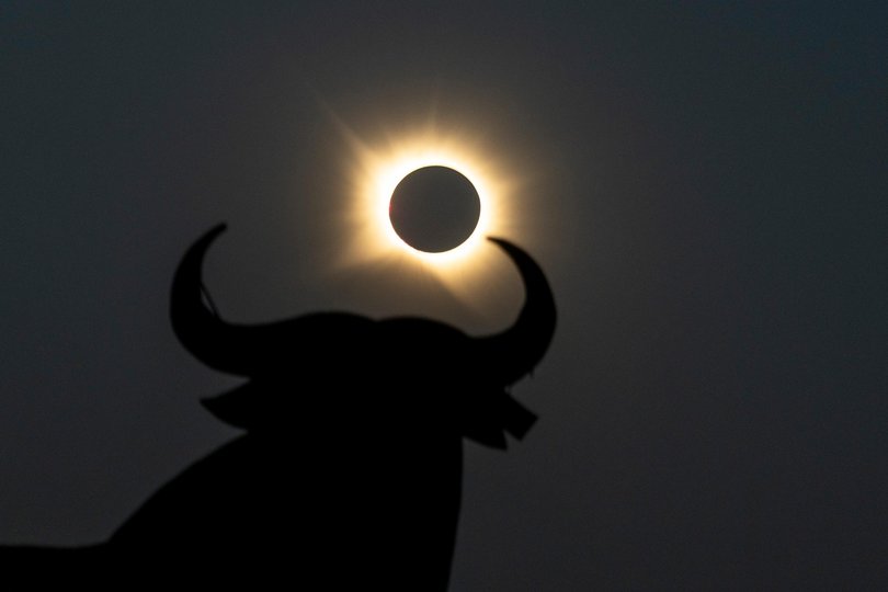 A view of the sun behind El Toro Osborne 'The Osborne Bull'.